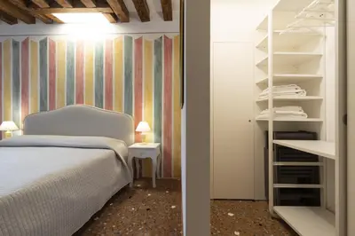 Letto o letti in una camera di Rialto Sant'Aponal Prestige by Wonderful Italy