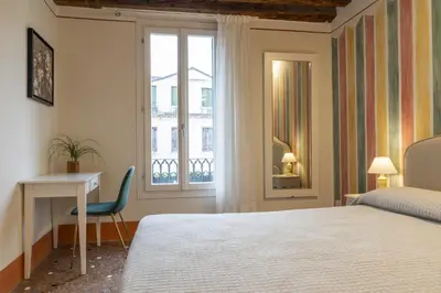 Letto o letti in una camera di Rialto Sant'Aponal Prestige by Wonderful Italy