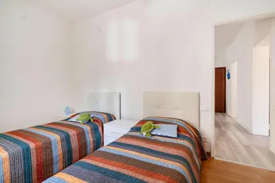 Letto o letti in una camera di Casa Lido Venezia center located with balconies
