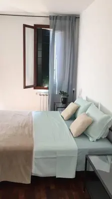 Letto o letti in una camera di Casa vacanze Giorgetta n 4 Open Space