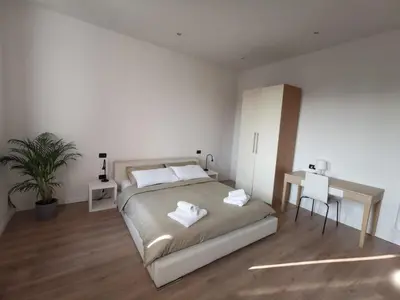 Letto o letti in una camera di Civico21