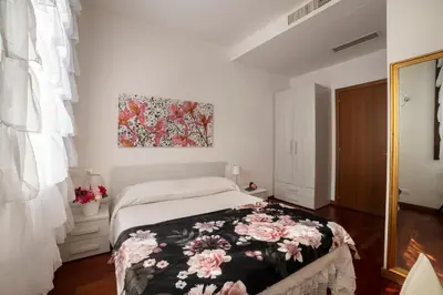 Letto o letti in una camera di Ca' degli Specchieri
