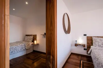 Letto o letti in una camera di Ai Sogni