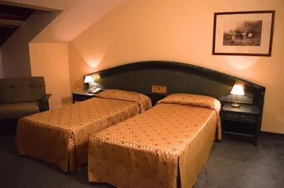 Letto o letti in una camera di Antica Postumia