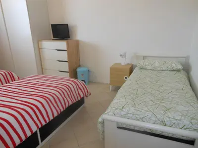 Letto o letti in una camera di B&B Relax