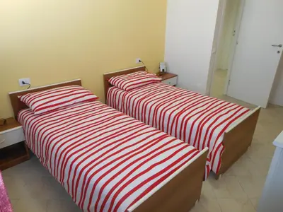 Letto o letti in una camera di B&B Relax