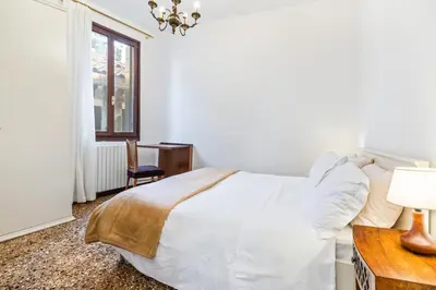 Letto o letti in una camera di Del Remer Apartment - 5mins from San Marco sq