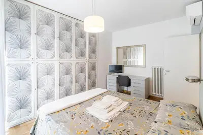 Letto o letti in una camera di Quattro Fontane Apartment
