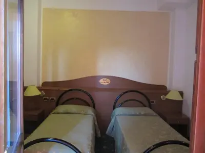Letto o letti in una camera di Hotel Green castellani