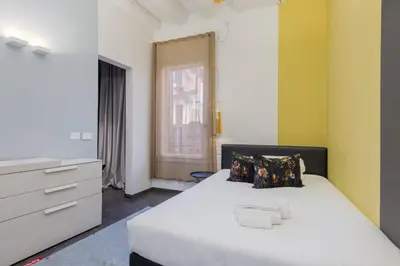 Letto o letti in una camera di Tadomo - Corte del Cafetier