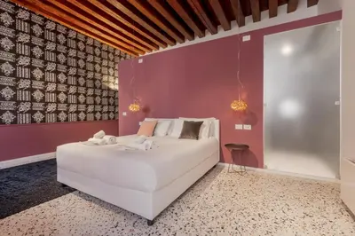 Letto o letti in una camera di Tadomo - Corte del Cafetier