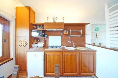Cucina o angolo cottura di DolceVita Apartments N 453 Canal View