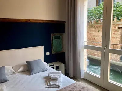 Letto o letti in una camera di Magno Luxury Apt Canal View