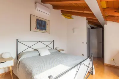 Letto o letti in una camera di Dadahome elegante appartamento vicino al centro