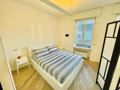 Letto o letti in una camera di LOFT IN PIAZZA VITTORIA