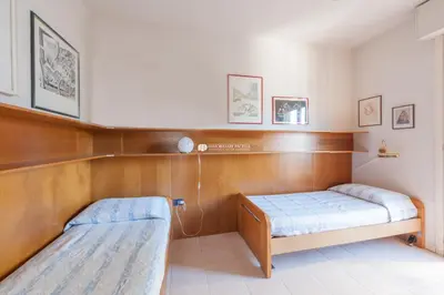 Letto o letti in una camera di Residence El Palmar Immobiliare Pacella
