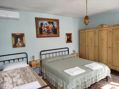 Letto o letti in una camera di Sweet Home New