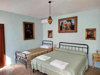 Letto o letti in una camera di Sweet Home New