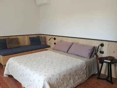 Letto o letti in una camera di B&B Mirò