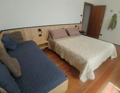 Letto o letti in una camera di B&B Mirò