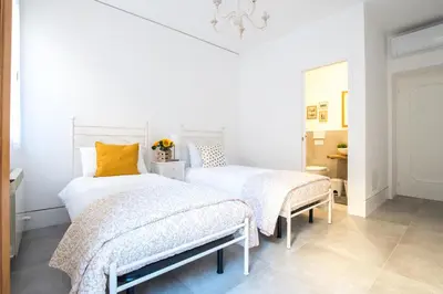 Letto o letti in una camera di Biennale Apartments Venice