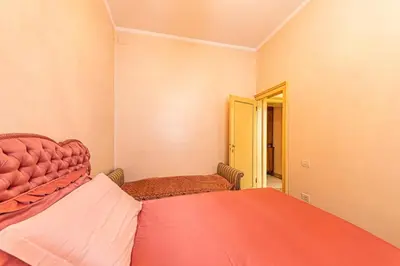 Letto o letti in una camera di CASA VESCOVO, free Wi-Fi near San Marco Square
