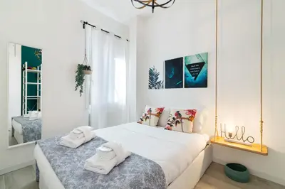 Letto o letti in una camera di GuestHost - Garden Mini Flat Specola
