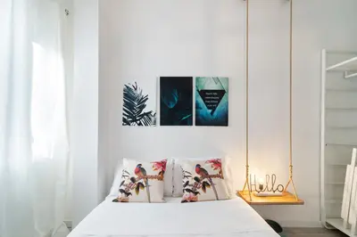 Letto o letti in una camera di GuestHost - Garden Mini Flat Specola
