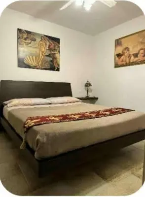 Letto o letti in una camera di Ca' Marcella