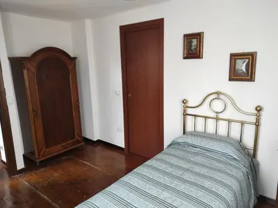 Letto o letti in una camera di Villa Flangini