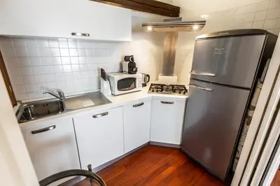 Cucina o angolo cottura di San Pantalon Luxury Penthouse R&R