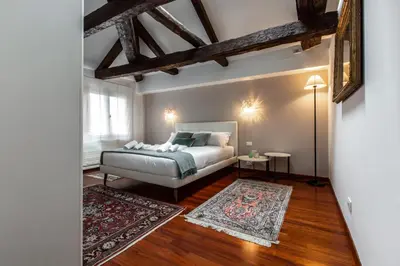 Letto o letti in una camera di San Pantalon Luxury Penthouse R&R