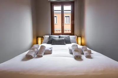 Letto o letti in una camera di Charming Apartment on the Grand Canal R&R