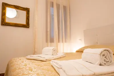 Letto o letti in una camera di The Heart of San Marco - WiFi