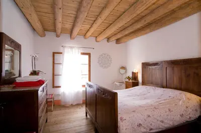 Letto o letti in una camera di Le Fade