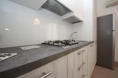 Cucina o angolo cottura di Residence Verdena appartamento 02