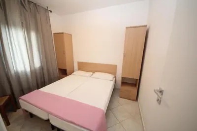 Letto o letti in una camera di Villa Debby appartamento 01