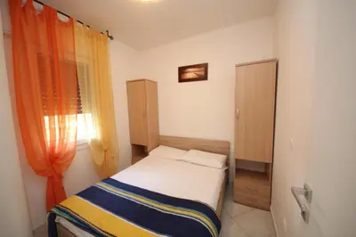 Letto o letti in una camera di Villa Debby appartamento 02
