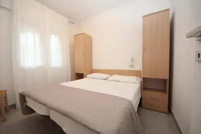 Letto o letti in una camera di Villa Debby appartamento 02