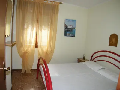 Letto o letti in una camera di Villa Milviana appartamento