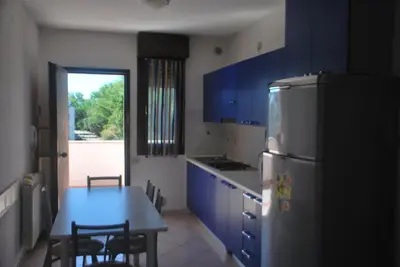 Cucina o angolo cottura di Acquasmeralda appartamento 01