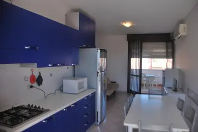 Cucina o angolo cottura di Acquasmeralda appartamento 01