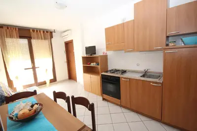 Cucina o angolo cottura di Acquasmeralda appartamento 03
