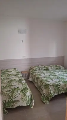 Letto o letti in una camera di Villa Gloria appartamento D01