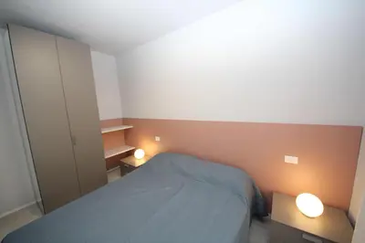 Letto o letti in una camera di Residence Sporting