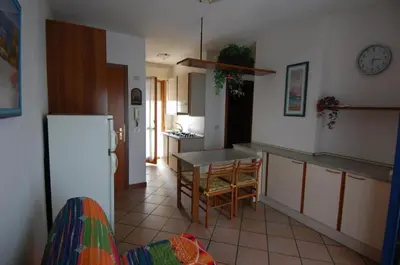 Cucina o angolo cottura di Villaggio Tirreno appartamento 01
