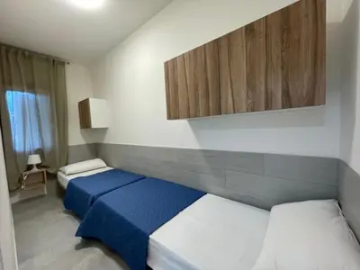 Letto o letti in una camera di Villa Antonio appartamento 01