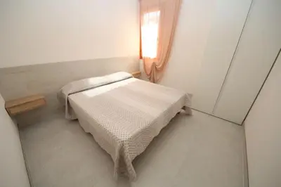 Letto o letti in una camera di Villa Antonio appartamento 03