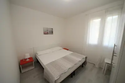 Letto o letti in una camera di Villa Manu appartamento 01