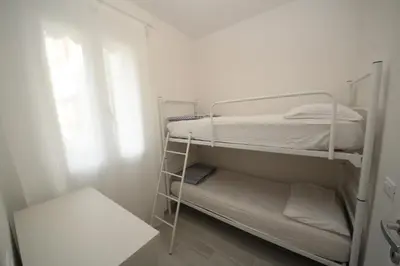 Letto o letti in una camera di Villa Manu appartamento 02
